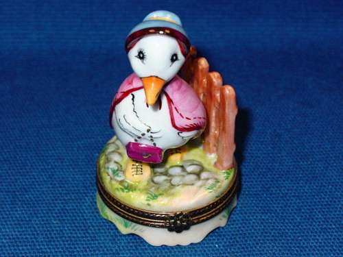 MOTHER GOOSE BY FENCE
